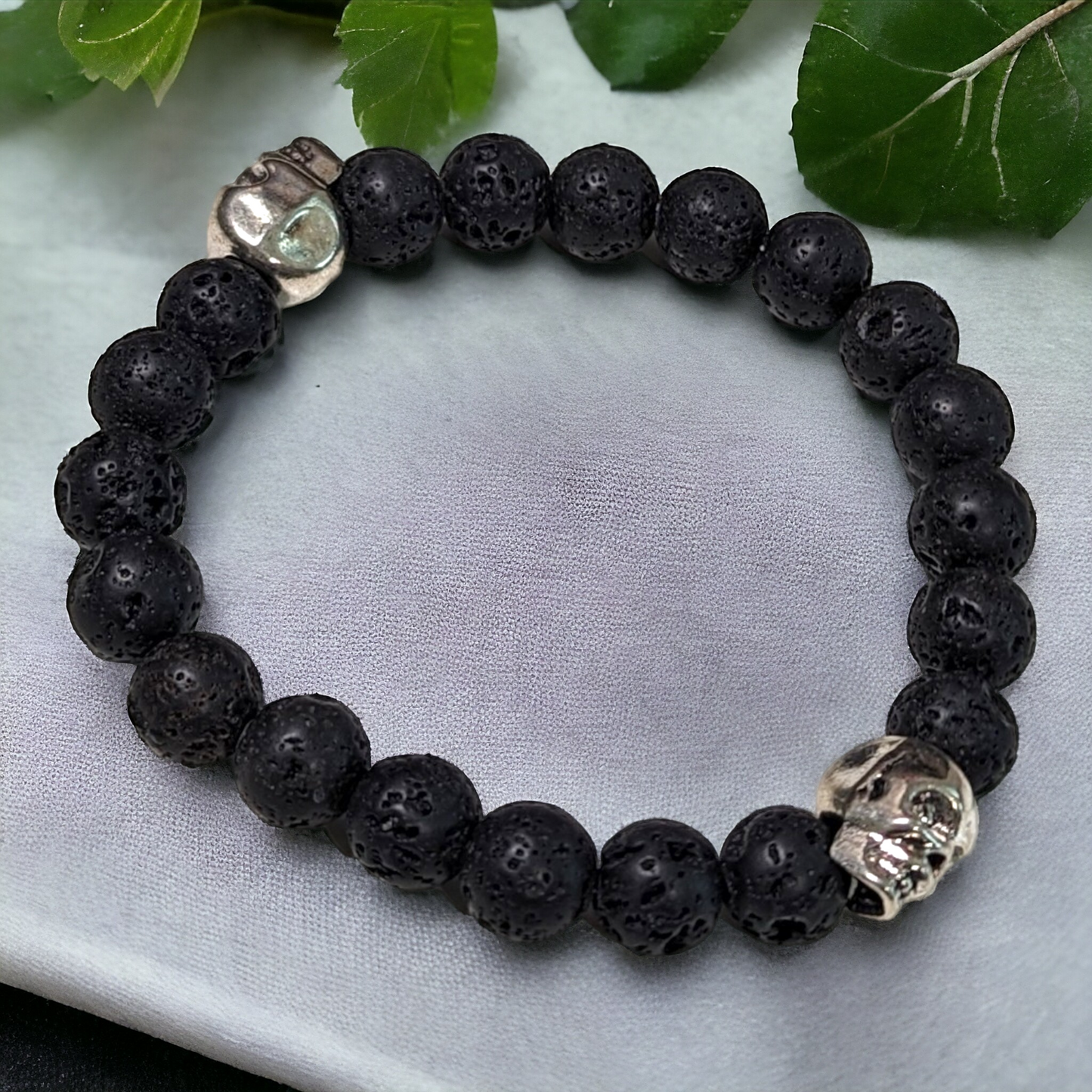 Black Lava Beads with Silver Skulls Stretch Bracelet