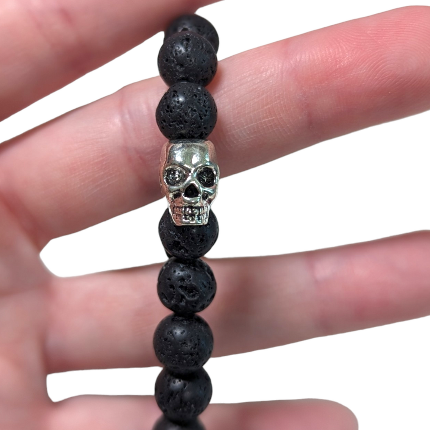 Black Lava Beads with Silver Skulls Stretch Bracelet